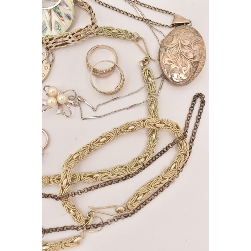 101 - AN ASSORTMENT OF WHITE METAL JEWELLERY, to include a large silver foliate pattern locket, hallmarked... 