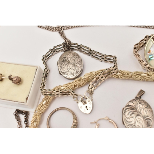 101 - AN ASSORTMENT OF WHITE METAL JEWELLERY, to include a large silver foliate pattern locket, hallmarked... 