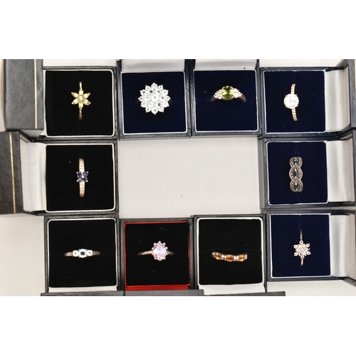 110 - A SELECTION OF TEN WHITE METAL GEM SET RINGS, various designs, set with assorted cubic zirconia or s... 