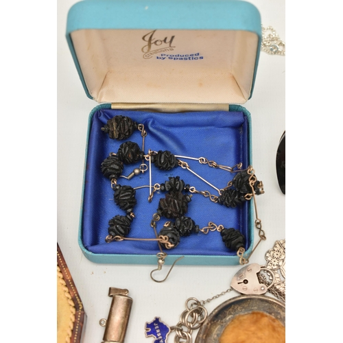 111 - ASSORTED ITEMS, to include a cased sewing set, comprising of a thimble, scissors, needle, needle cas... 