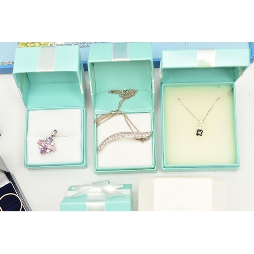 123 - A BOX OF ASSORTED WHITE METAL PENDANT NECKLACES AND PENDANTS, various designs, to include chains, so... 