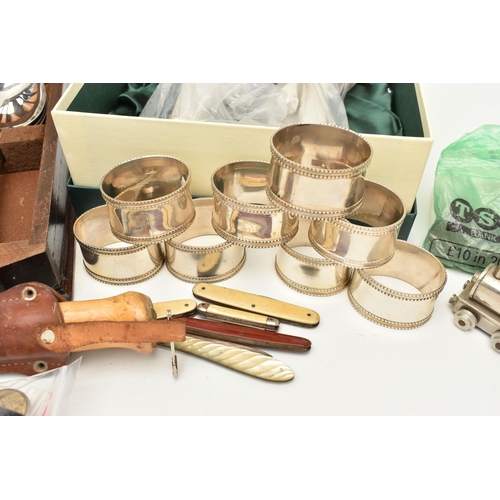 130 - A BOX OF ASSORTED ITEMS, to include two 'Parks London' candlestick holder sets, a 22ct gold plated c... 