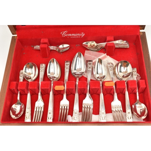 133 - A CANTEEN OF CUTLERY, a wooden canteen, encasing an incomplete cutlery set, case signed 'Community b... 