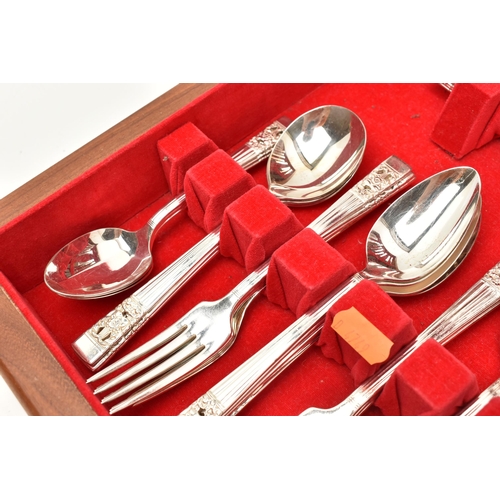 133 - A CANTEEN OF CUTLERY, a wooden canteen, encasing an incomplete cutlery set, case signed 'Community b... 