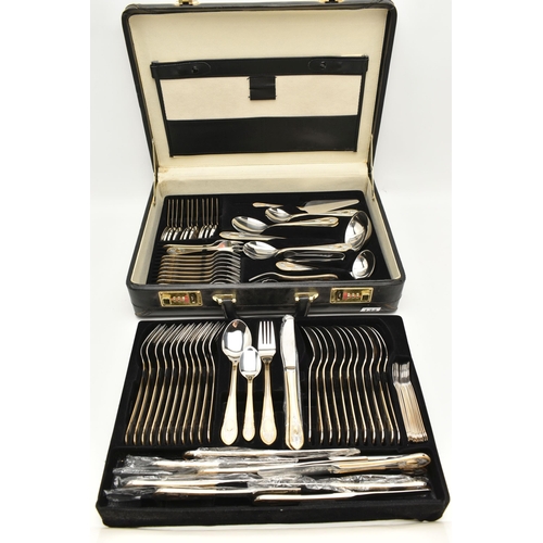 134 - A BRIEFCASE CANTEEN OF CUTLERY, twelve person table setting of two tone stainless steel cutlery, inc... 