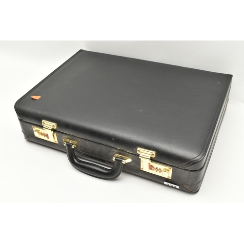 134 - A BRIEFCASE CANTEEN OF CUTLERY, twelve person table setting of two tone stainless steel cutlery, inc... 