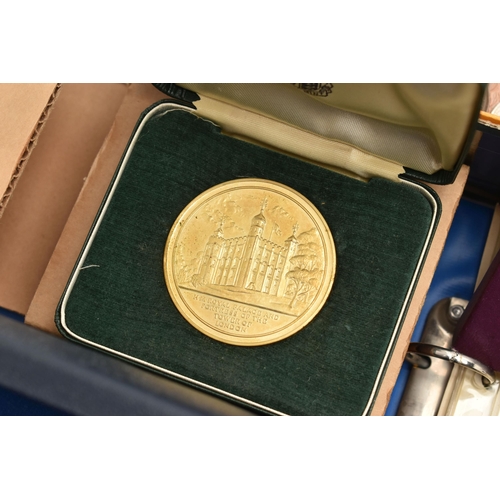 179 - A CARDBOARD TRAY OF MAINLY UK COINAGE, to include a boxed of Three Medals of HRH Prince Charles Inve... 