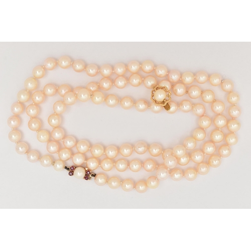 185 - A CULTURED PEARL NECKLACE AND A SINGLE EARRING, the single strand of cultured round white pearls wit... 