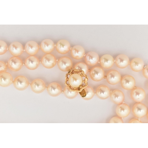 185 - A CULTURED PEARL NECKLACE AND A SINGLE EARRING, the single strand of cultured round white pearls wit... 