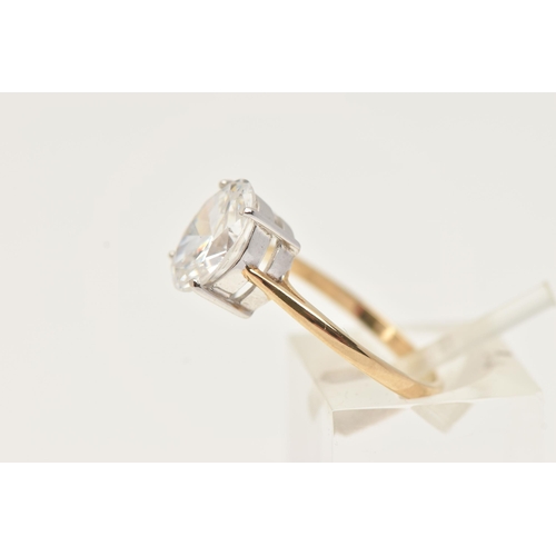 187 - A 9CT GOLD CUBIC ZIRCONIA RING, designed with an oval cut colourless cubic zirconia in a four claw w... 