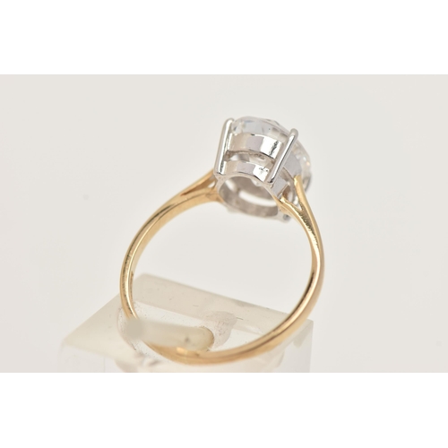 187 - A 9CT GOLD CUBIC ZIRCONIA RING, designed with an oval cut colourless cubic zirconia in a four claw w... 