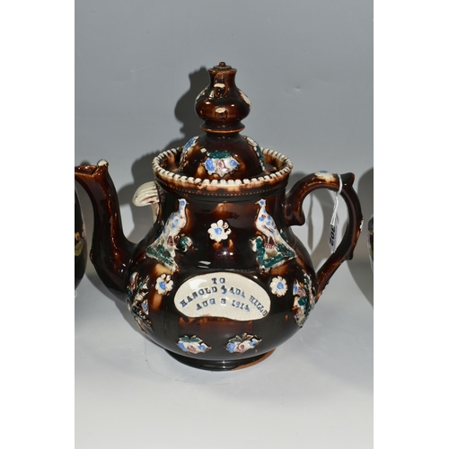 302 - A LARGE MEASHAM POTTERY BARGEWARE TEAPOT, decorated in traditional  design having typical moulded fl... 