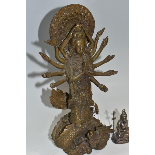 303 - A BRASS FIGURE OF 'THOUSAND HAND KUAN YIN', height 27cm, together with a small white metal 'Lord Shi... 