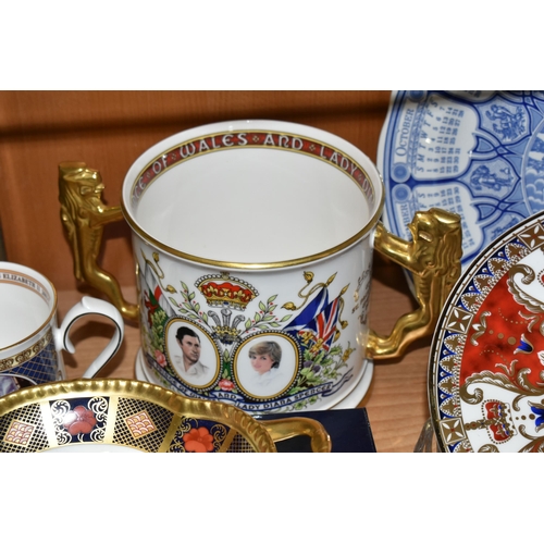 322 - A GROUP OF NAMED ROYAL COMMEMORATIVE CERAMICS, comprising a limited edition boxed Royal Crown Derby ... 