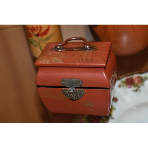 328 - THREE JAPANESE KOKESHI WOODEN DOLLS AND A CASE OF VAUTINE'S SCENT BOTTLES, comprising both vintage m... 