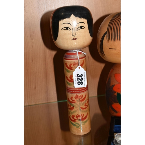 328 - THREE JAPANESE KOKESHI WOODEN DOLLS AND A CASE OF VAUTINE'S SCENT BOTTLES, comprising both vintage m... 