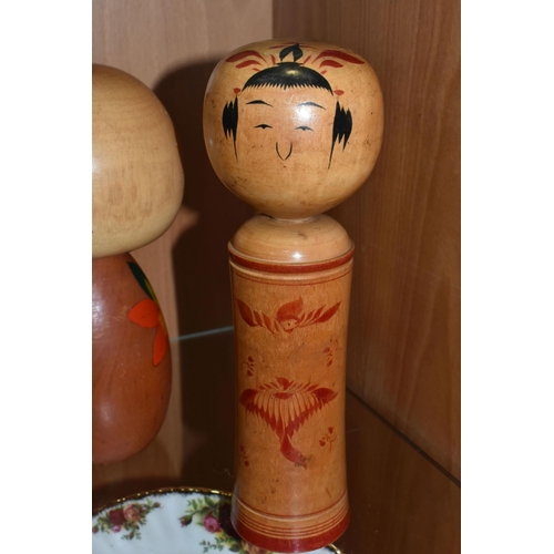 328 - THREE JAPANESE KOKESHI WOODEN DOLLS AND A CASE OF VAUTINE'S SCENT BOTTLES, comprising both vintage m... 