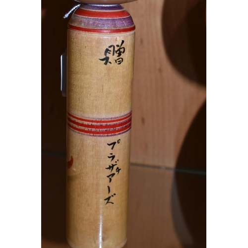 328 - THREE JAPANESE KOKESHI WOODEN DOLLS AND A CASE OF VAUTINE'S SCENT BOTTLES, comprising both vintage m... 