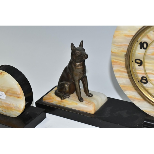 333 - AN ART DECO ONYX AND BLACK MARBLE CLOCK GARNITURE, of geometric form, surmounted by two figures of G... 