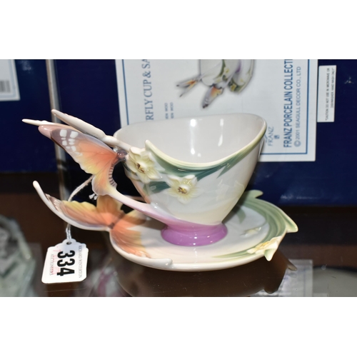 334 - A GROUP OF BOXED FRANZ PORCELAIN, comprising Butterfly Collection: Butterfly cup and saucer XP1693 w... 