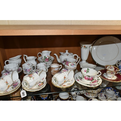 341 - A GROUP OF CERAMIC TEAWARE, comprising Royal Crown Derby 'Derby Posies': teapot, two cream jugs, sug... 