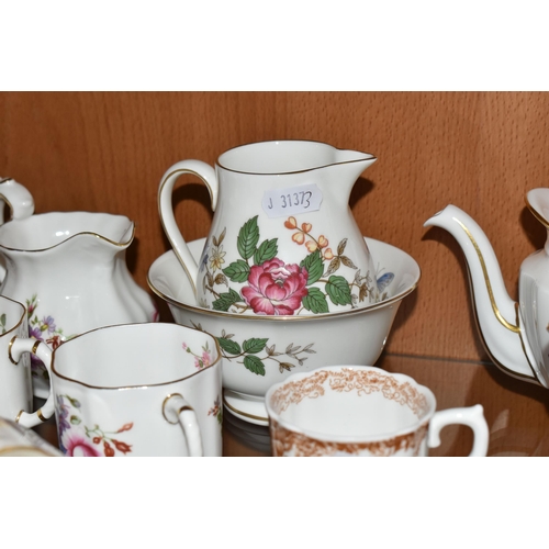 341 - A GROUP OF CERAMIC TEAWARE, comprising Royal Crown Derby 'Derby Posies': teapot, two cream jugs, sug... 