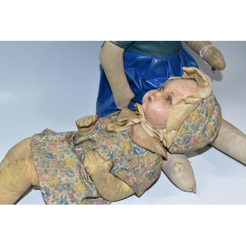 350 - TWO VINTAGE DOLLS, the smaller with painted cloth head, the larger having a composition head, each w... 