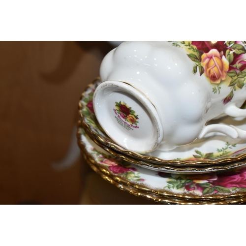 355 - A TWENTY TWO PIECE ROYAL ALBERT OLD COUNTRY ROSES TEA SET, comprising a teapot, a cream jug, a sugar... 