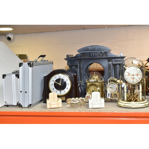 386 - A GROUP OF CLOCKS AND ORNAMENTS to include a Smiths mantel clock (pendulum and key included) with de... 