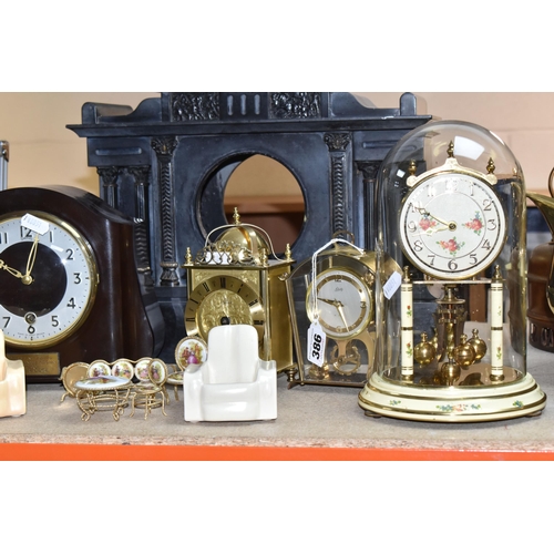 386 - A GROUP OF CLOCKS AND ORNAMENTS to include a Smiths mantel clock (pendulum and key included) with de... 