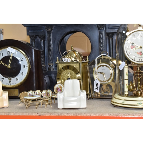 386 - A GROUP OF CLOCKS AND ORNAMENTS to include a Smiths mantel clock (pendulum and key included) with de... 