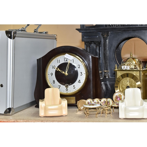 386 - A GROUP OF CLOCKS AND ORNAMENTS to include a Smiths mantel clock (pendulum and key included) with de... 