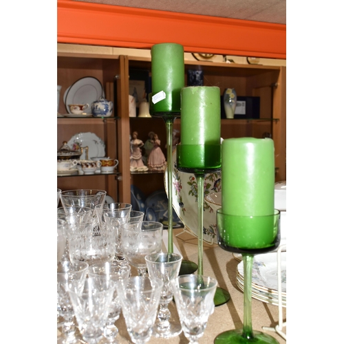 389 - A QUANTITY OF MOSTLY CRYSTAL CUT GLASSWARE three green Wedgwood Brancaster descending candlesticks w... 