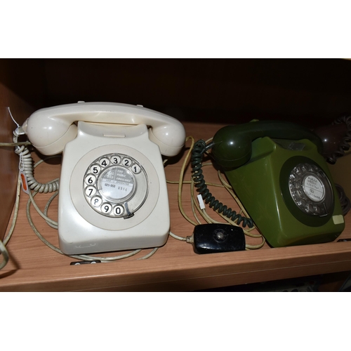 413 - A GROUP OF EIGHT ROTARY DIAL VINTAGE TELEPHONES to include seven GEN 746 telephones in various shade... 