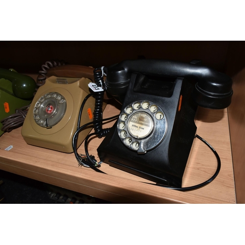 413 - A GROUP OF EIGHT ROTARY DIAL VINTAGE TELEPHONES to include seven GEN 746 telephones in various shade... 