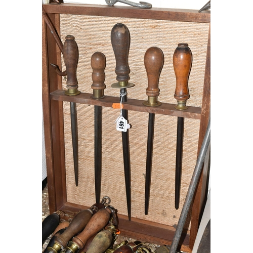 461 - A COLLECTION OF MEAT CLEAVERS AND KNIFE SHARPENERS, to include nine wooden handled meat cleavers, on... 