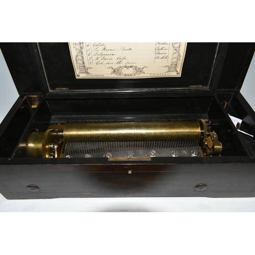 464 - A NINETEENTH CENTURY CYLINDER MUSIC BOX, ebonised case with inlaid decoration of a spray of flowers,... 