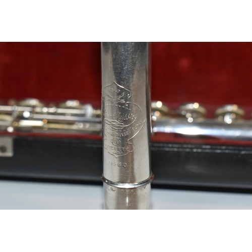 469 - A CASED FRENCH CLEMENT MASSON FLUTE with an engraved 1947 Clement Masson La Couture-Boussey Erevete ... 