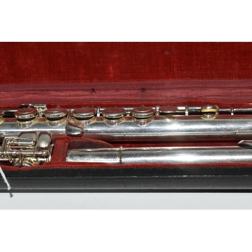 469 - A CASED FRENCH CLEMENT MASSON FLUTE with an engraved 1947 Clement Masson La Couture-Boussey Erevete ... 