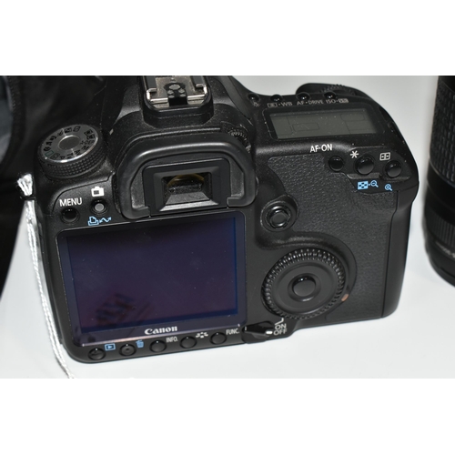 471 - A CANON EOS 50D AND ACCESSORIES comprising a Canon EOS 50D fitted with a Sigma Zoom 28-70mm 1:2.8-4 ... 