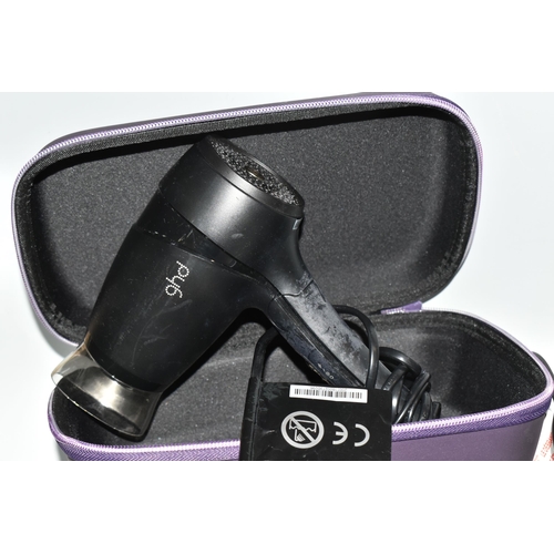 477 - A BOX OF HAIRSTYLING ELECTRICALS comprising a GHD Flight 2.0 hairdryer with purple carry case (origi... 