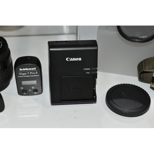 487 - A BOX OF CANON CAMERAS AND LENSES, to include, Canon EOS 1200D fitted with a Canon zoom lens 28-80mm... 