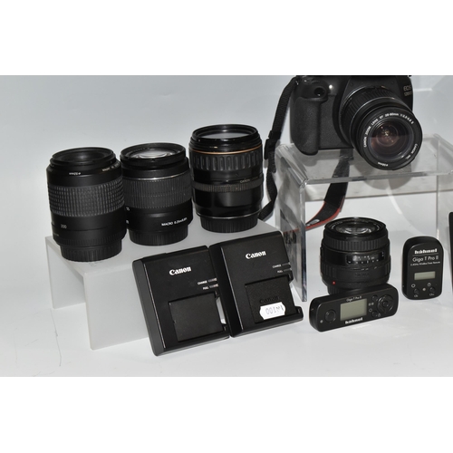 487 - A BOX OF CANON CAMERAS AND LENSES, to include, Canon EOS 1200D fitted with a Canon zoom lens 28-80mm... 