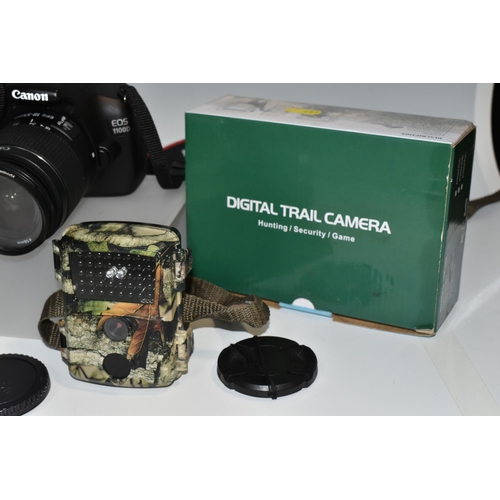 487 - A BOX OF CANON CAMERAS AND LENSES, to include, Canon EOS 1200D fitted with a Canon zoom lens 28-80mm... 