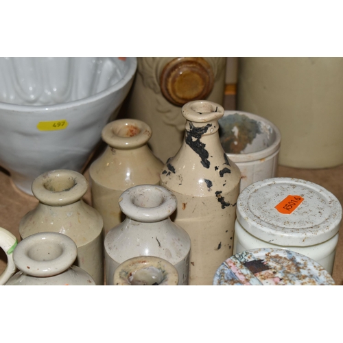 497 - A GROUP OF STONEWARE AND CERAMICS, comprising a Victorian jelly mould, foot warmer, jars and bottles... 