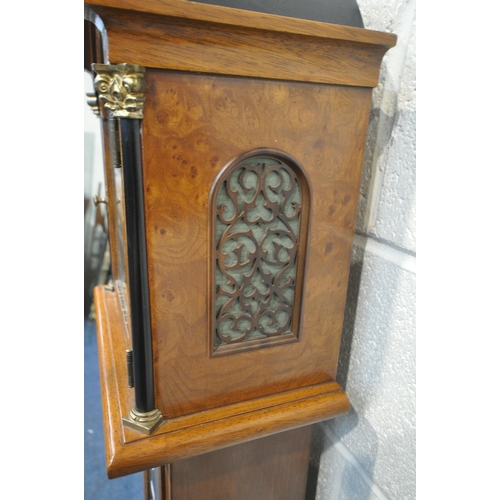 1215 - A LATE 20TH CENTURY WALNUT GRANDMOTHER CLOCK, the arched hood with three brass finials, the glass do... 