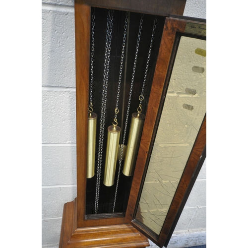 1215 - A LATE 20TH CENTURY WALNUT GRANDMOTHER CLOCK, the arched hood with three brass finials, the glass do... 