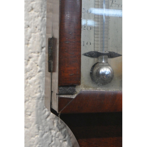 1217 - A GEORGIAN MAHOGANY CISTERN BAROMETER, the arched glass door enclosing a face signed J Casartelli, L... 