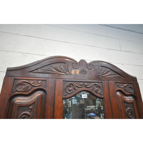 1222 - A 20TH CENTURY MAHOGANY WARDROBE, with a single bevelled mirror door, above a single drawer, width 9... 