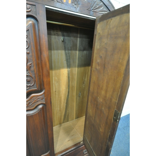 1222 - A 20TH CENTURY MAHOGANY WARDROBE, with a single bevelled mirror door, above a single drawer, width 9... 